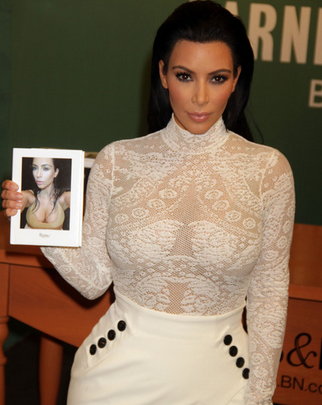 Ким Кардашян представила свою книгу в прозрачной блузке